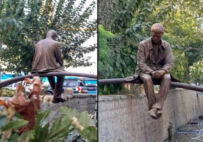 مجسمه برنزی مرد نشسته مرمت شد